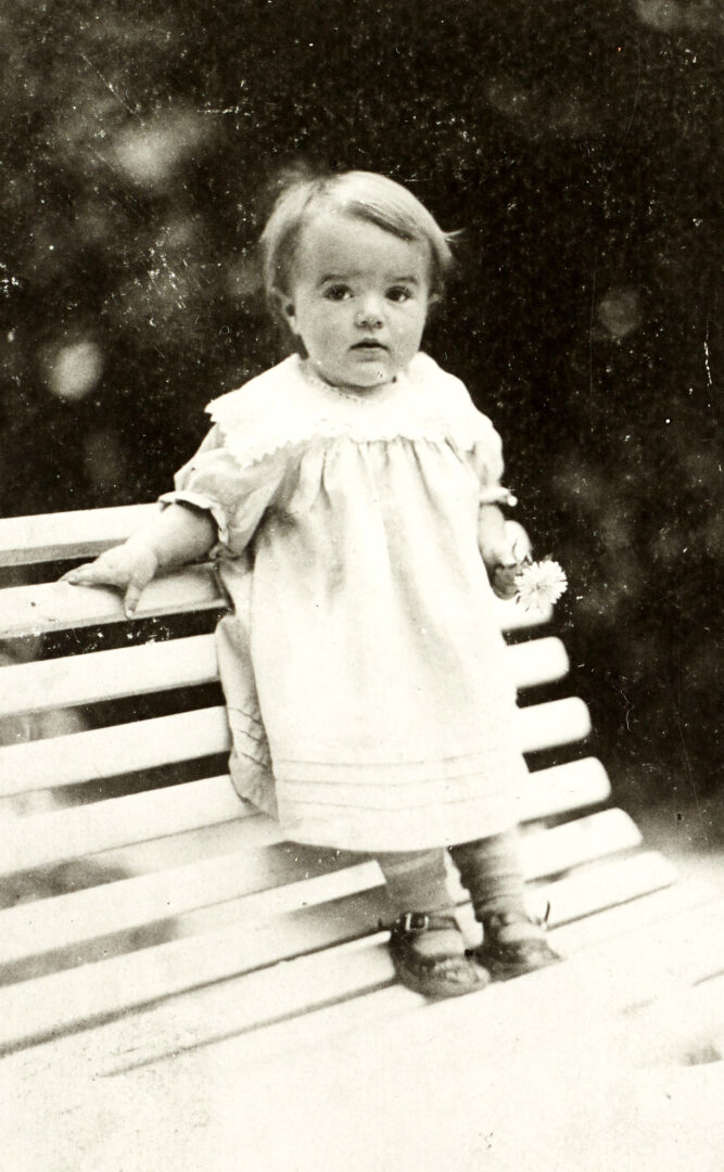 DX700/13 Helen Clark standing on a garden seat, in Hughesovka aged about 2 years, Hughesovka, c1916